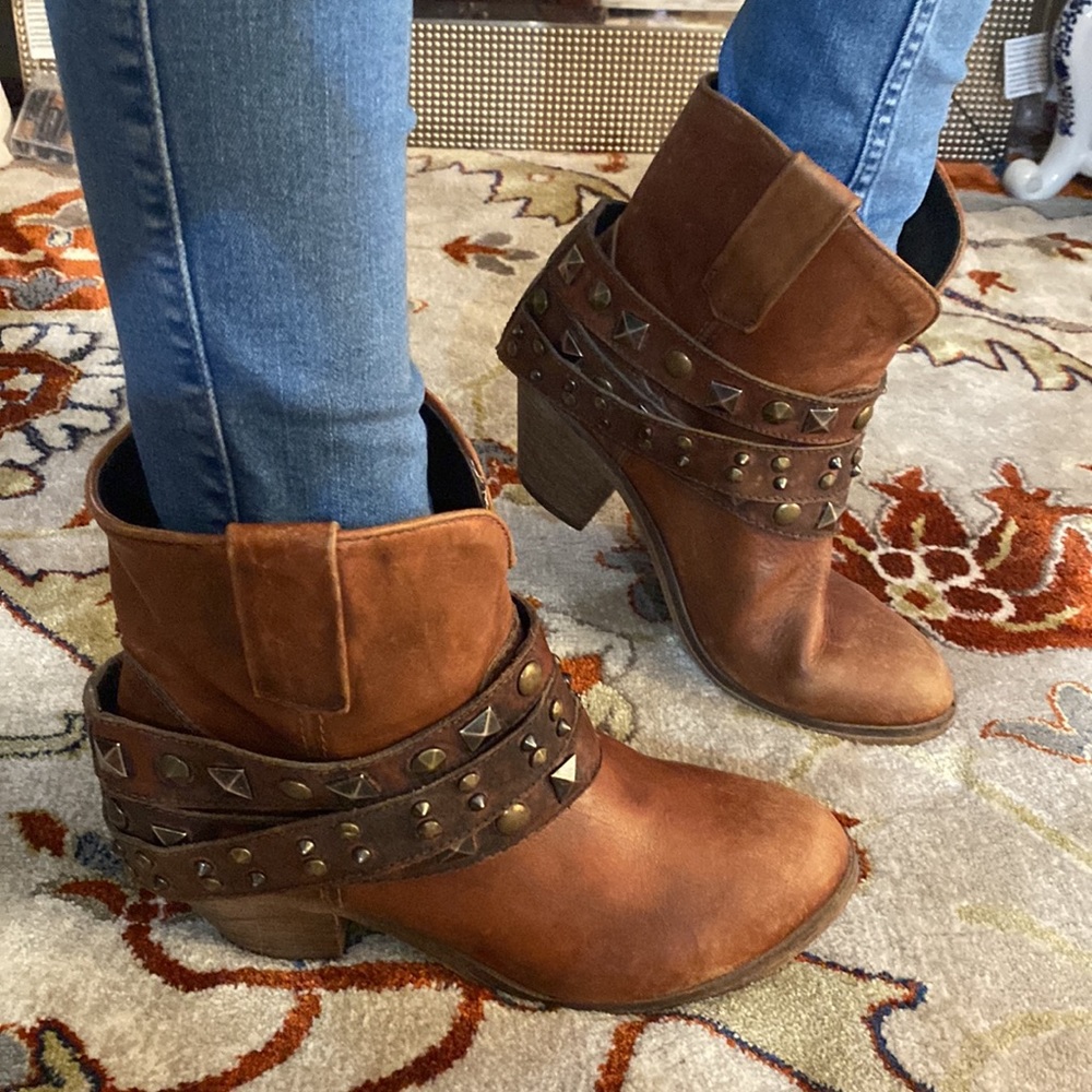 Corral real leather booties size 9 with draping straps with metal studs.